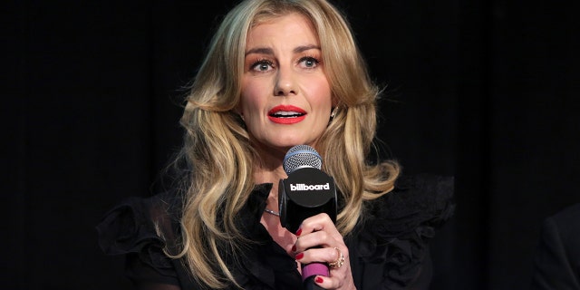 Faith Hill discussed her time singing the National Anthem at the Super Bowl in 2000.