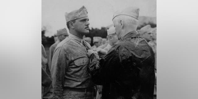 Lt. Frank Tachovsky is awarded the Silver Star from Adm. Chester Nimitz.