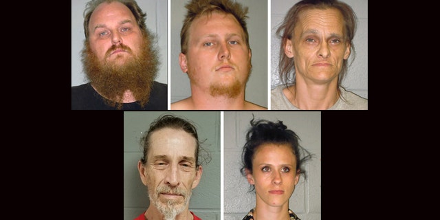 This combination of undated booking photos from the Shenandoah County (Virginia) Sheriff's Office shows from left to right, Donny Salyers, Dennis Salyers, Farrah Salyers, Christopher Sharp and Amanda Salyers. (Shenandoah County Sheriff's Office via AP)
