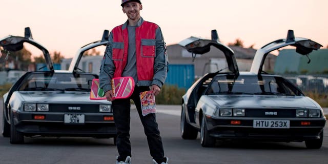 Complete with an authentic Marty McFly jacket, cap and sneakers, Sam can be seen soaring alongside one of the most iconic movie cars of all time. It is believed to be the closest anyone has ever come to flying a real-life hoverboard made famous by the 1989 classic Back to the Future Part II. (Credit: SWNS)
