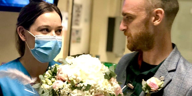 Nathan Judge, right, surprised Charlotte Medcalf on what was originally supposed to be their wedding day.