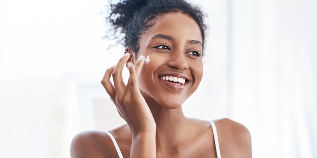 Moisturizing creams can improve the skin barrier and minimize irritation from face masks, experts say. (iStock)