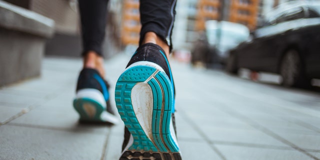 Close up shot of runner's shoes.