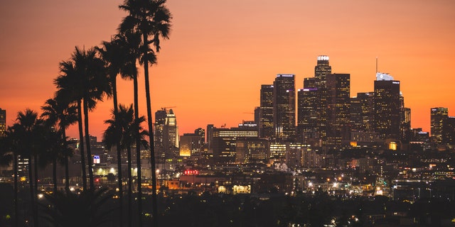 The skyline of Los Angeles at dusk. 