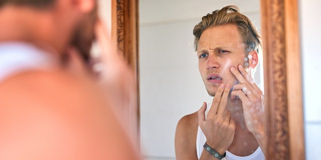For those prone to acne, experts generally recommend products containing salicylic acid or benzoyl peroxide (at a concentration of 5.5 percent or less). (iStock)