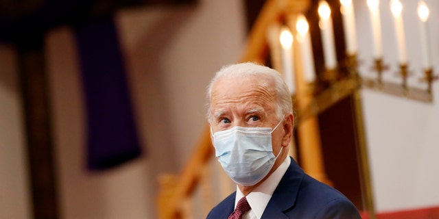 Democratic presidential candidate, former Vice President Joe Biden listens as clergy members and community activists speak during a visit to Bethel AME Church in Wilmington, Del., Monday, June 1, 2020. (AP Photo/Andrew Harnik)