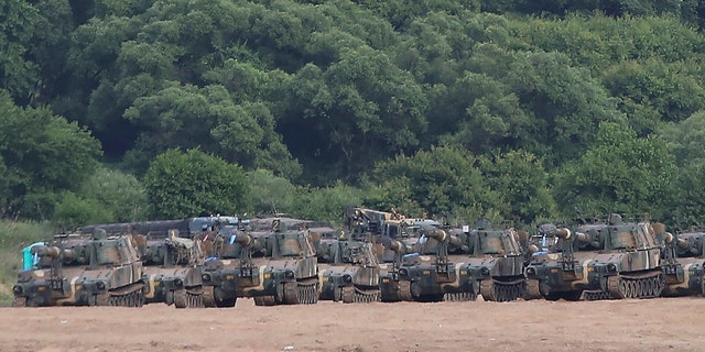 South Korean army's K-55 self-propelled howitzers are seen at the border with North Korea, South Korea, Tuesday, June 16, 2020. North Korea blew up an inter-Korean liaison office building just inside its border in an act Tuesday that sharply raises tensions on the Korean Peninsula amid deadlocked nuclear diplomacy with the United States. (AP Photo/Ahn Young-joon)