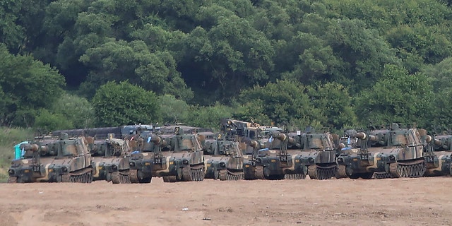 South Korean army's K-55 self-propelled howitzers are seen at the border with North Korea, South Korea, Tuesday, June 16, 2020. North Korea blew up an inter-Korean liaison office building just inside its border in an act Tuesday that sharply raises tensions on the Korean Peninsula amid deadlocked nuclear diplomacy with the United States. (AP Photo/Ahn Young-joon)