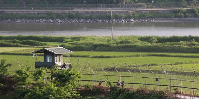 South Korean army soldiers patrol along the barbed-wire fence in Paju, South Korea, near the border with North Korea on June 15, 2020. (AP Photo/Ahn Young-joon) - File