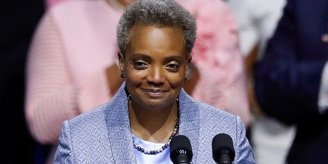 Lori Lightfoot speaks after being sworn in as Chicago's 56th mayor by Judge Susan E. Cox during an inauguration ceremony at Wintrust Arena in Chicago last year. (REUTERS/Kamil Krzaczynski)