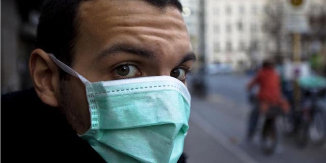 Early face mask adoption linked to modest infection rates.