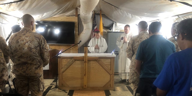 Archbishop Timothy Broglio, archbishop of U.S. Military Services, celebrates Mass with U.S. and Italian service members deployed in Niamey, Niger, Nov. 3, 2019. (Courtesy Photo)