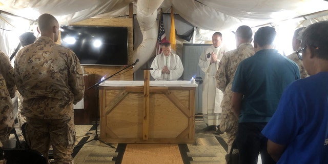 Archbishop Timothy Broglio, archbishop of U.S. Military Services, celebrates Mass with U.S. and Italian service members deployed in Niamey, Niger, Nov. 3, 2019. (Courtesy Photo)