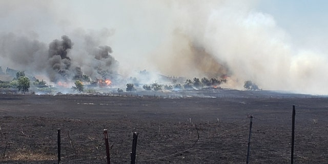 The Nelson Fire in Butte County, California destroyed three homes and scorched some 95 acres on Wednesday.