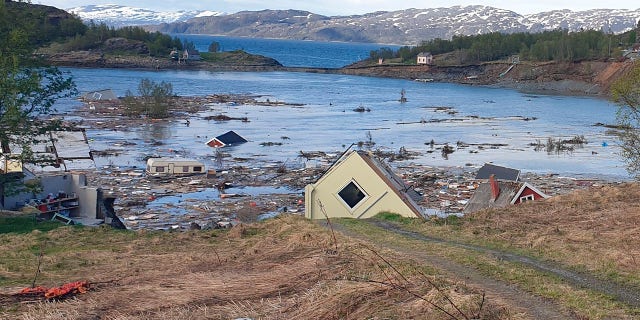 Debris fills the bay near Alta, northern Norway after a powerful landslide that swept eight houses into the sea. (Anders Bjordal/NTB Scanpix via AP)