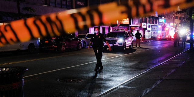 Police gather at the scene where two New York City police officers were shot in a confrontation in Brooklyn on June 3, 2020 in New York City. (Photo by Spencer Platt/Getty Images)