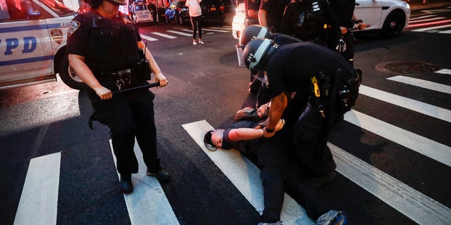 NYPD cops pulled from DA offices after corrupt prosecutors declined to charge arrested leftist George Floyd protesters Nypd3-AP