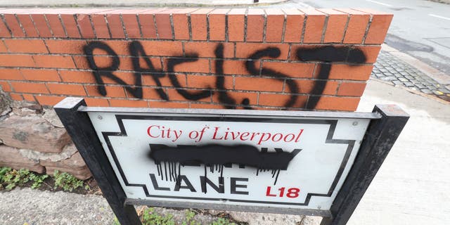 A road sign for Penny Lane, made famous by The Beatles, after it was vandalized following perceived links with slave trader James Penny, in Liverpool, England, on Friday. (AP)