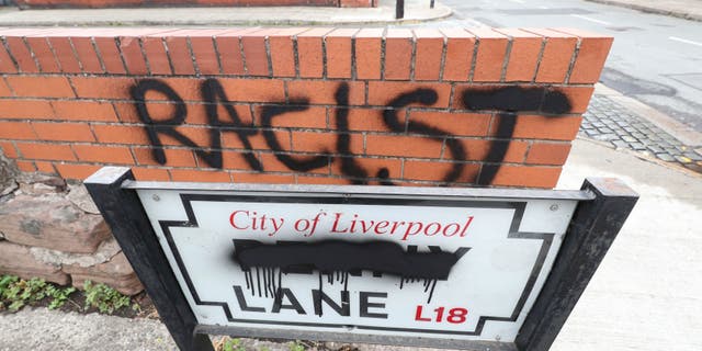 A road sign for Penny Lane, made famous by The Beatles, after it was vandalized following perceived links with slave trader James Penny, in Liverpool, England, on Friday. (AP)