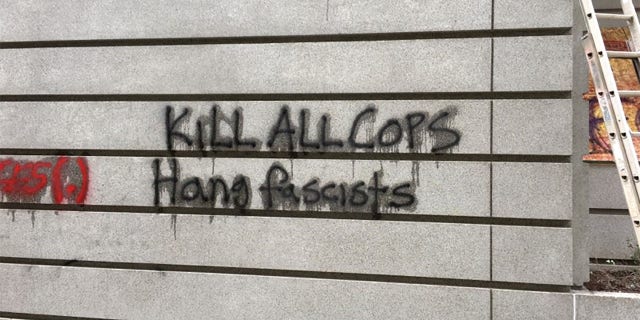 Anti-cop graffiti reading “Kill All Cops" was found on a Portland building during a demonstration that turned violent on Saturday, police said.
