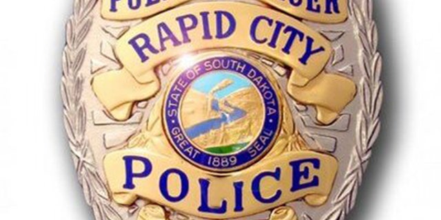 A police spokesman in Rapid City, S.D., is asking armed citizens to avoid helping police do their jobs, saying such groups hinder police efforts to control protesters.