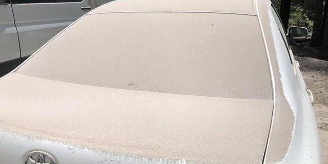 Dust on vehicles after a magnitude 5.8 earthquake triggered a rockslide at Whitney Portal in California on Wednesday.