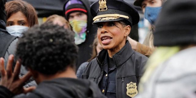 Seattle police Chief Carmen Best talks with activists in an undated photo. (Associated Press)