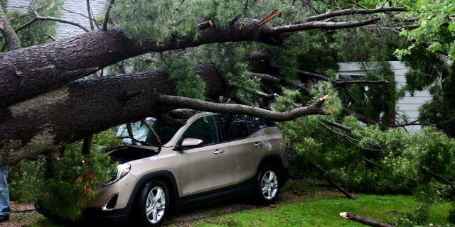 Storm damage is seen at a home on Main Street in Concord, Mich., on June 10.