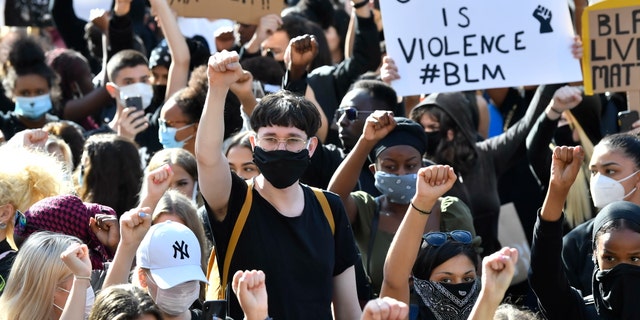 Protesters take part in a George Floyd demonstration in Stockholm, Sweden, on Wednesday. (/TT via AP)