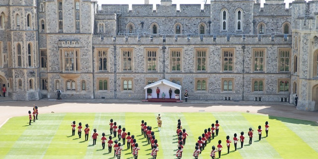 A general view of Trooping The Colour, the Queen's birthday ceremony at Windsor Castle on June 13, 2020 in Windsor, England. In line with Government advice, it was agreed that The Queen's Birthday Parade, also known as Trooping the Colour, would not go ahead in its traditional form.