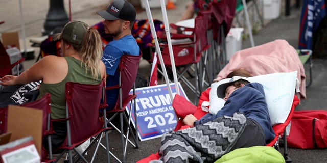 June 19: Supporters of President Trump sleep in the early morning while lined up to attend the Trump campaign rally near the BOK Center, in Tulsa, Oklahoma.  (Photo by Win McNamee/Getty Images)
