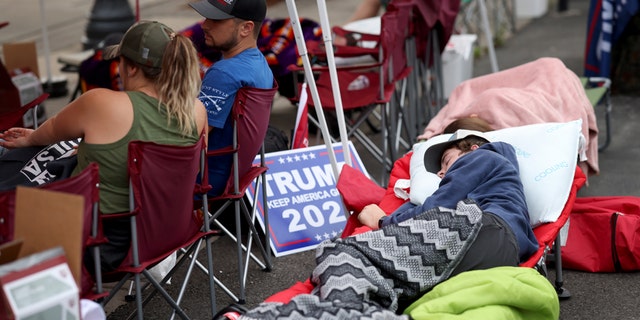 June 19: Supporters of President Trump sleep in the early morning while lined up to attend the Trump campaign rally near the BOK Center, in Tulsa, Oklahoma.  (Photo by Win McNamee/Getty Images)