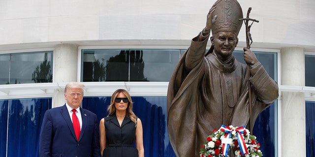 President Donald Trump and first lady Melania Trump visit Saint John Paul II National Shrine, Tuesday, June 2, 2020, in Washington. (Associated Press)