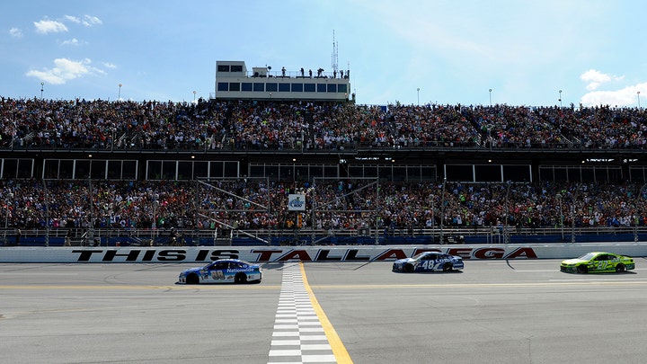 NASCAR fans return to the stands for the GEICO 500