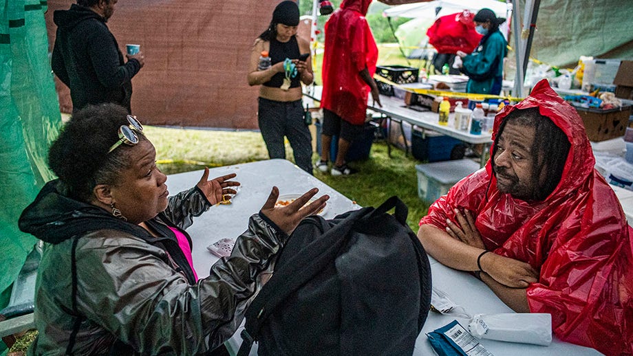 Minneapolis neighborhood that vowed not to call police in wake of Floyd death is already being tested by 300-strong homeless encampment