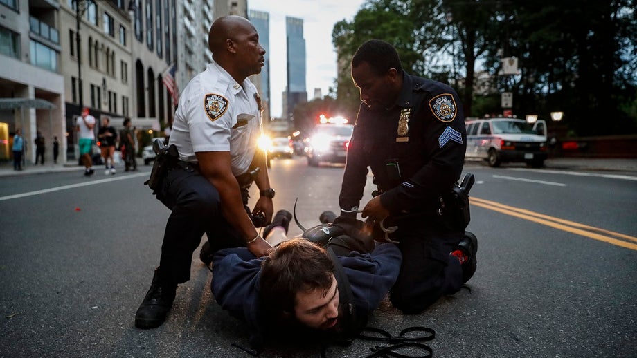 NYPD confronts George Floyd crowds as curfew takes effect; Buffalo clash gets 2 cops suspended