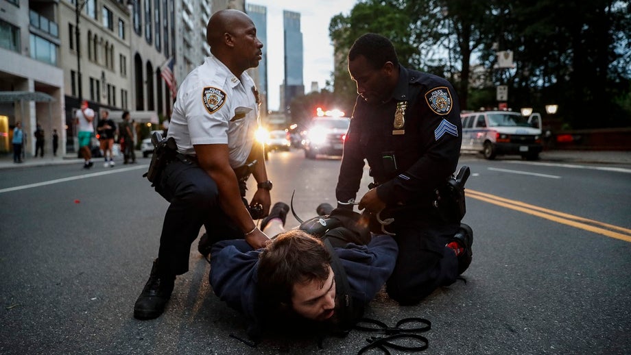 NYPD confronts George Floyd crowds as curfew takes effect; Buffalo clash gets 2 cops suspended