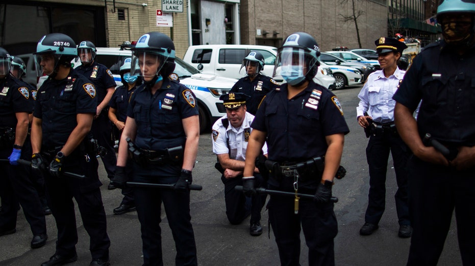 Uniform Police Focus on Face Masks - The New York Times