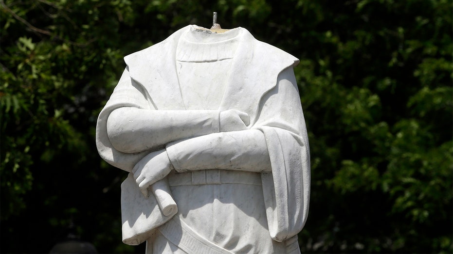 Christopher Columbus statues torn down, drenched in paint, defaced in