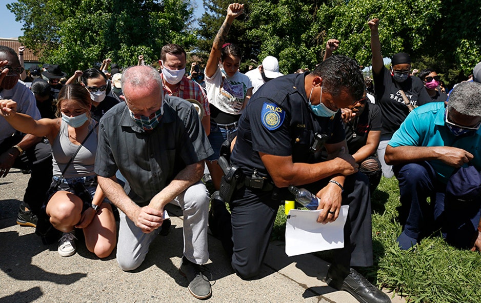 George Floyd protesters embrace 'taking a knee' for race awareness ...