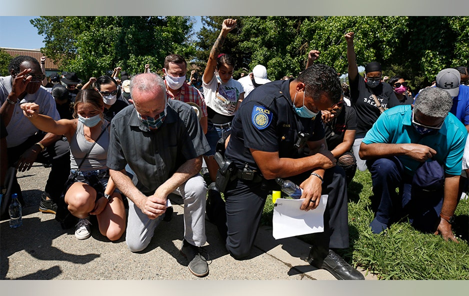 George Floyd protesters embrace 'taking a knee' for race awareness ...