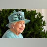 Britain's Queen Elizabeth II reacts as she looks out during a ceremony to mark her official birthday at Windsor Castle in Windsor, England, June 13, 2020.?