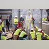 Workers prepare to remove the Jefferson Davis statue from the Kentucky State Capitol in Frankfort, June 13, 2020.?