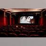 People sit in a cinema?after theaters reopened across the country following three months of closure due to the COVID-19 lockdown measures in Milan, Italy, June 15, 2020.