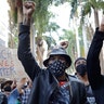 Rio de Janeiro, Brazil: People protest against crimes committed by the police against black people in the favelas, outside the Rio de Janeiro's state government, Brazil, as well as George Floyd's death, Sunday, May 31, 2020. 