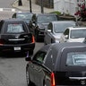 A procession of vehicles, including three hearses, meant to honor George Floyd, Breonna Taylor and Ahmaud Arbery, making its way through Boston neighborhoods.