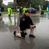  A police officer kneeling during a protest against police brutality in Sunrise, Fla., on June 2.