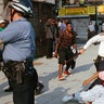 New York City police officers scuffling with a protester during a march through the Crown Heights section of Brooklyn, Aug. 21, 1991. Confrontations between police and protesters marked the third day of violence sparked by a car crash Monday night that left a 7-year-old black child dead and a Hasidic man stabbed to death in the melee that followed.