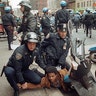 New York City police officers subduing a protester near 14th Street and Seventh Avenue in Manhattan on May 1, 1992, as several hundred protesters moved through the city after a peaceful demonstration in Times Square in reaction to the Rodney King verdict.