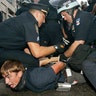 A protester being arrested by NYPD officers during the Republican National Convention in New York, Aug. 30, 2004.